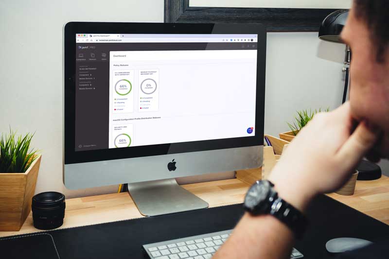 An iMac displaying the Jamf Pro dashboard.